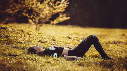 girl-lying-on-the-grass-1741487.jpeg